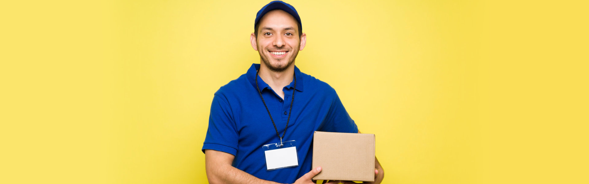 delivery man holding box